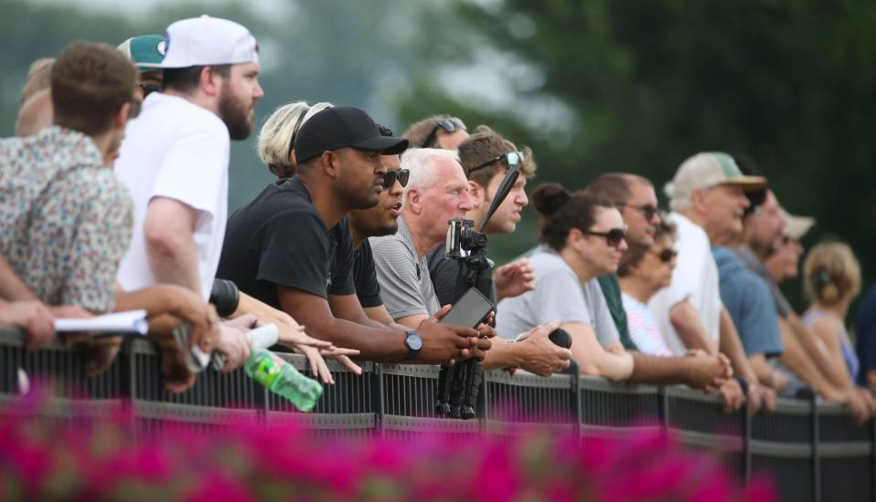 Fans line the rail as they wait for the field in the Delaware Handicap to come down the final stretch on July 8, 2023, at Delaware Park.