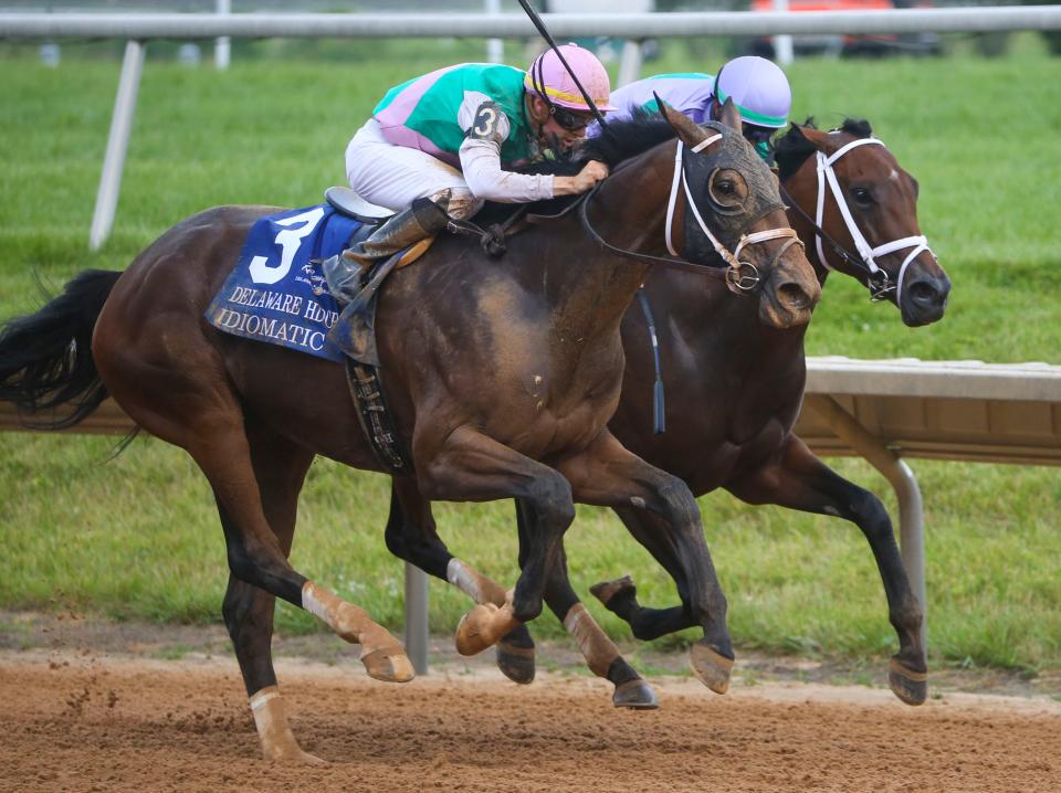 Idiomatic, ridden by Florent Geroux (front) gets past Classy Edition and Kendrick Carmouche at the wire to win the 2023 Delaware Handicap on July 8. Delaware Park's 75-day 2024 live racing meet begins Wednesday.