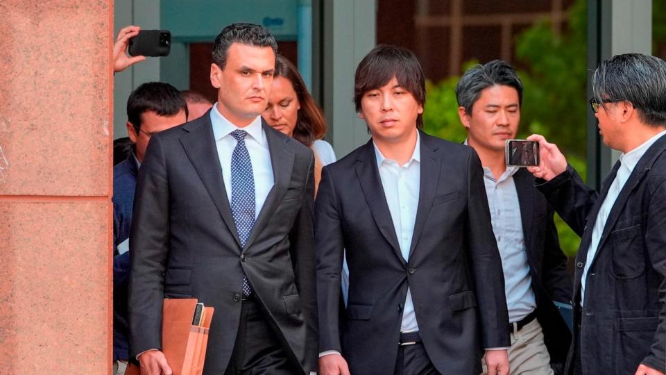 PHOTO: Ippei Mizuhara, center, the former longtime interpreter for the Los Angeles Dodgers baseball star Shohei Ohtani, leaves federal court following his arraignment, May 14, 2024, in Los Angeles. (Damian Dovarganes/AP, FILE)