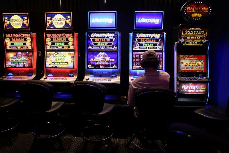 Analysis-Slots to smartphones: pandemic sends Australia's gambling problem online