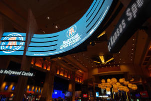 Digital banners advertise Barstool Sportsbook at Hollywood Casino where people can now legally place sports bets in the state.