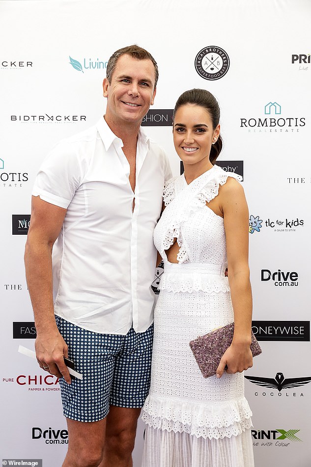 Wayne Carey and partner Jessica Paulke arrive at the Fashion Aid Twilight Beach Polo on February 16, 2018