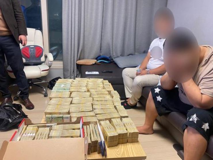 China-based online gambling ring busted; 20 arrested