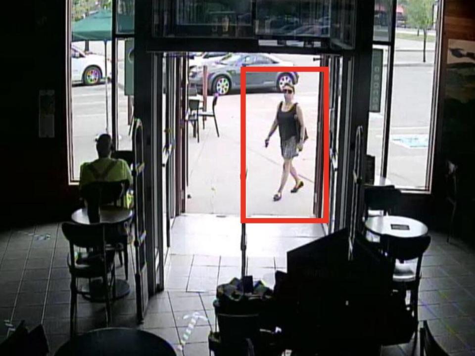 Surveillance camera video from a Calgary Starbucks shows Vida Smith entering around 12:30 p.m. on July 21, 2020, ahead of her meeting with Chris Lee. Smith was never seen or heard from again after she left the coffee shop. (Court exhibit - image credit)