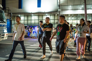 Chinese nationals working in the gambling sector in the Philippines in 2019 leave an office building in Paranaque after their shift. File photo: Martin San Diego / SCMP