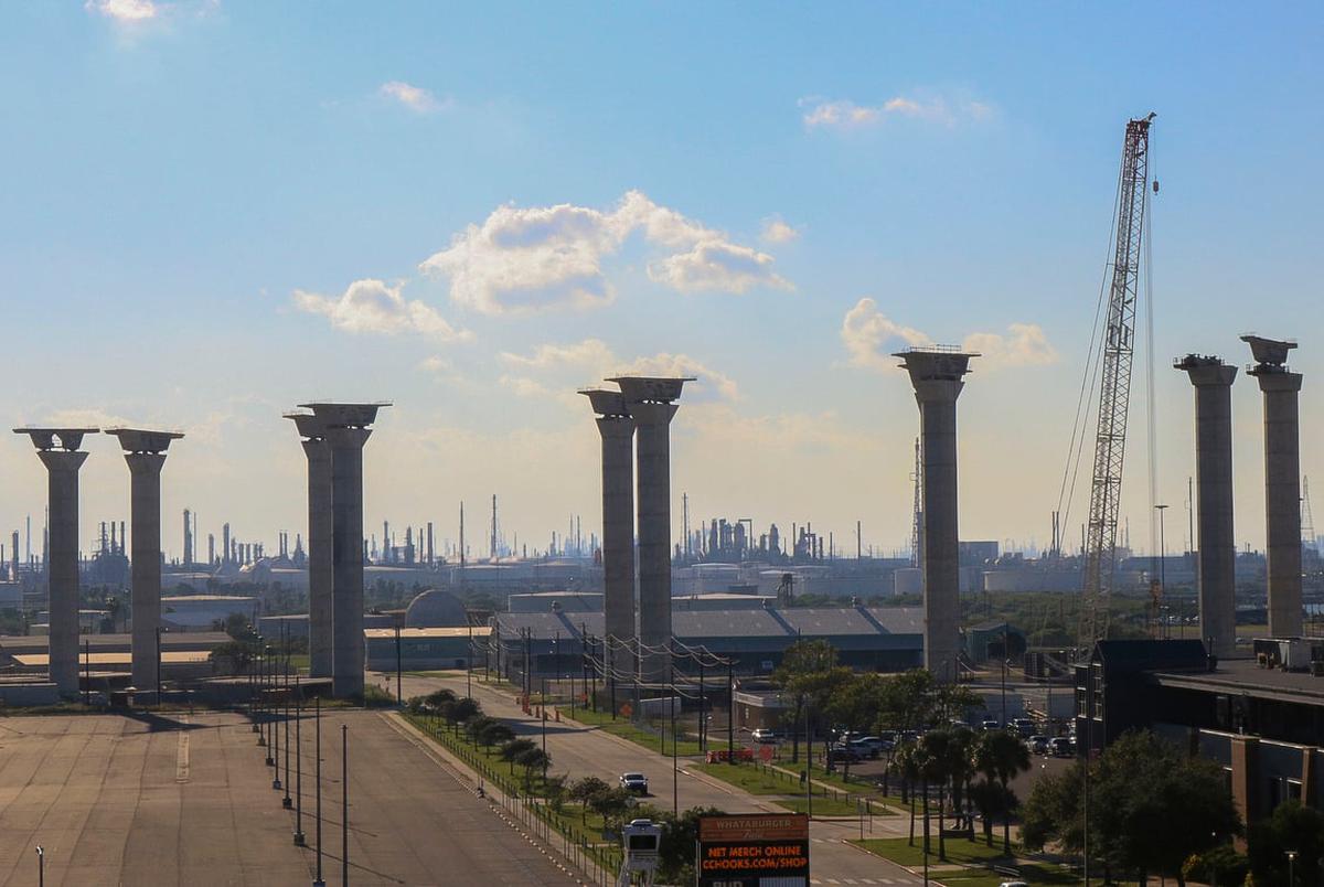 A colossal new bridge will allow much larger tanker ships to access refineries on the Corpus Christi Channel. Bridge construction, initially scheduled for 2020 completion, is currently suspended over design flaw concerns.