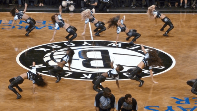 cheer leaders performing during halftime break at the NBA gaming gambling industry 