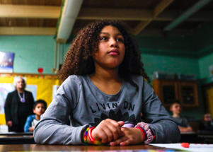 Libby Carrington, 9, pays attention to the video the Clan Mother Healing the Community on Thursday, Nov. 21, 2019, at Bowler Elementary School in Bowler, Wis. School districts across Wisconsin handle their Act 31 curriculum requirements which requires that schools teach Native American and/or First Nations history. "It was the best! I liked how she was talking about her son and how he died, but it was really sad too," Carrington said.