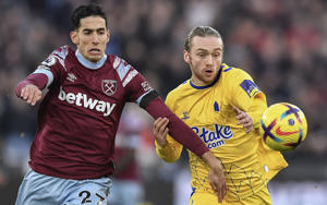 Nayef Aguerd of West Ham United (L) and Tom Davies of Everton (R) in action during the Premier League match between West Ham United and Everton FC - Gambling firms banned from sponsoring Premier League football shirts - Vince Mignott/GETTY