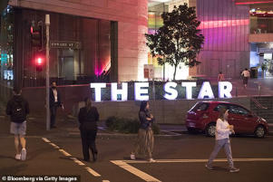 The Star said the jobs cuts, wage freeze and other planned measures would cut $100million from its operating budget for the next financial year (pictured The Star Casino in Sydney)