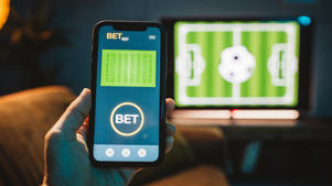 Phone with soccer betting app