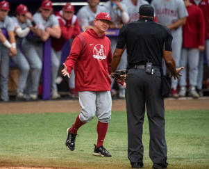 Alabama head coach Brad Bohannon, left, argues with umpire Joe Harris after being tossed from his team's game against LSU, Saturday, April 29, 2023.