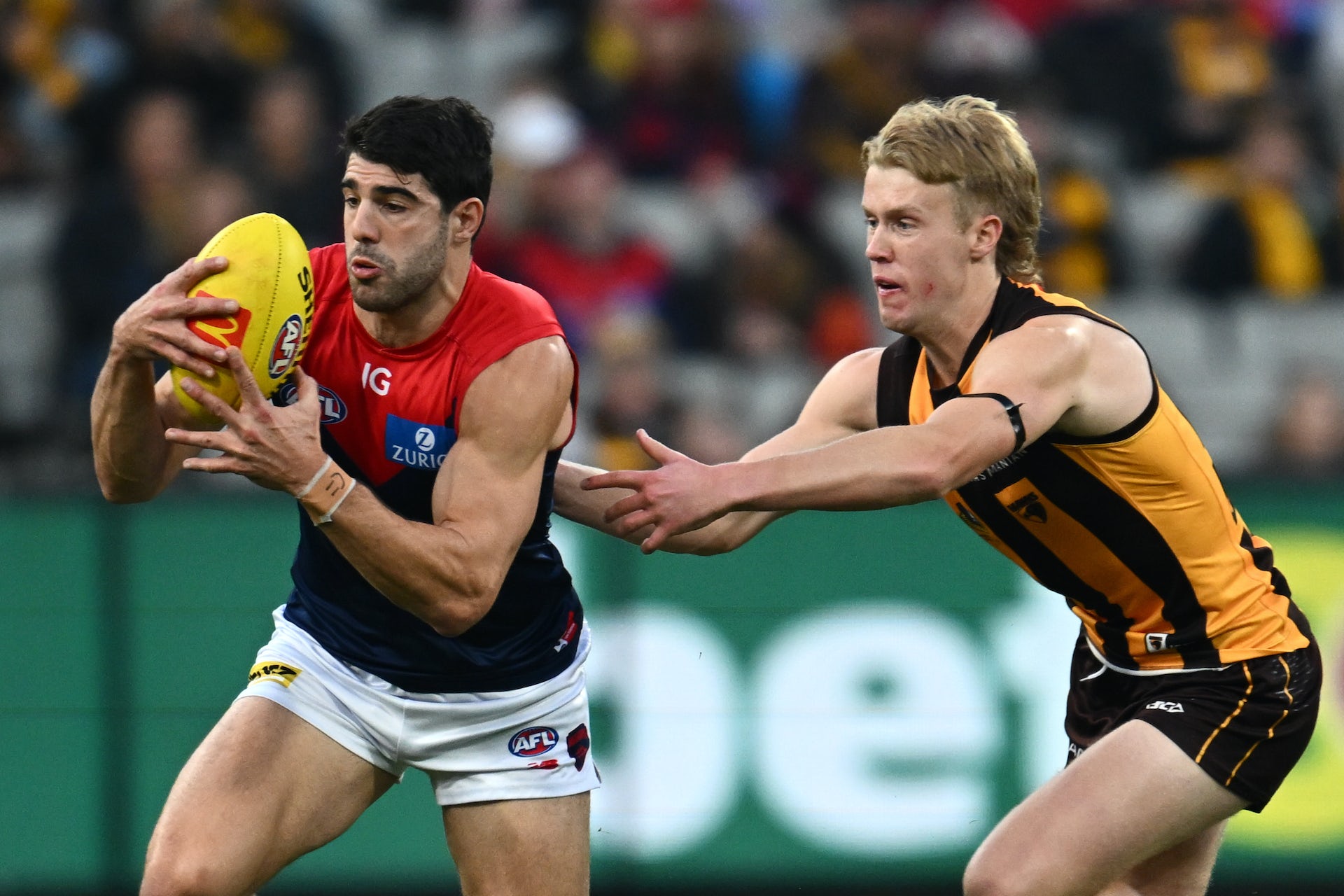 Stadium advertising for betting, shown at an AFL match, helps normalise gambling.