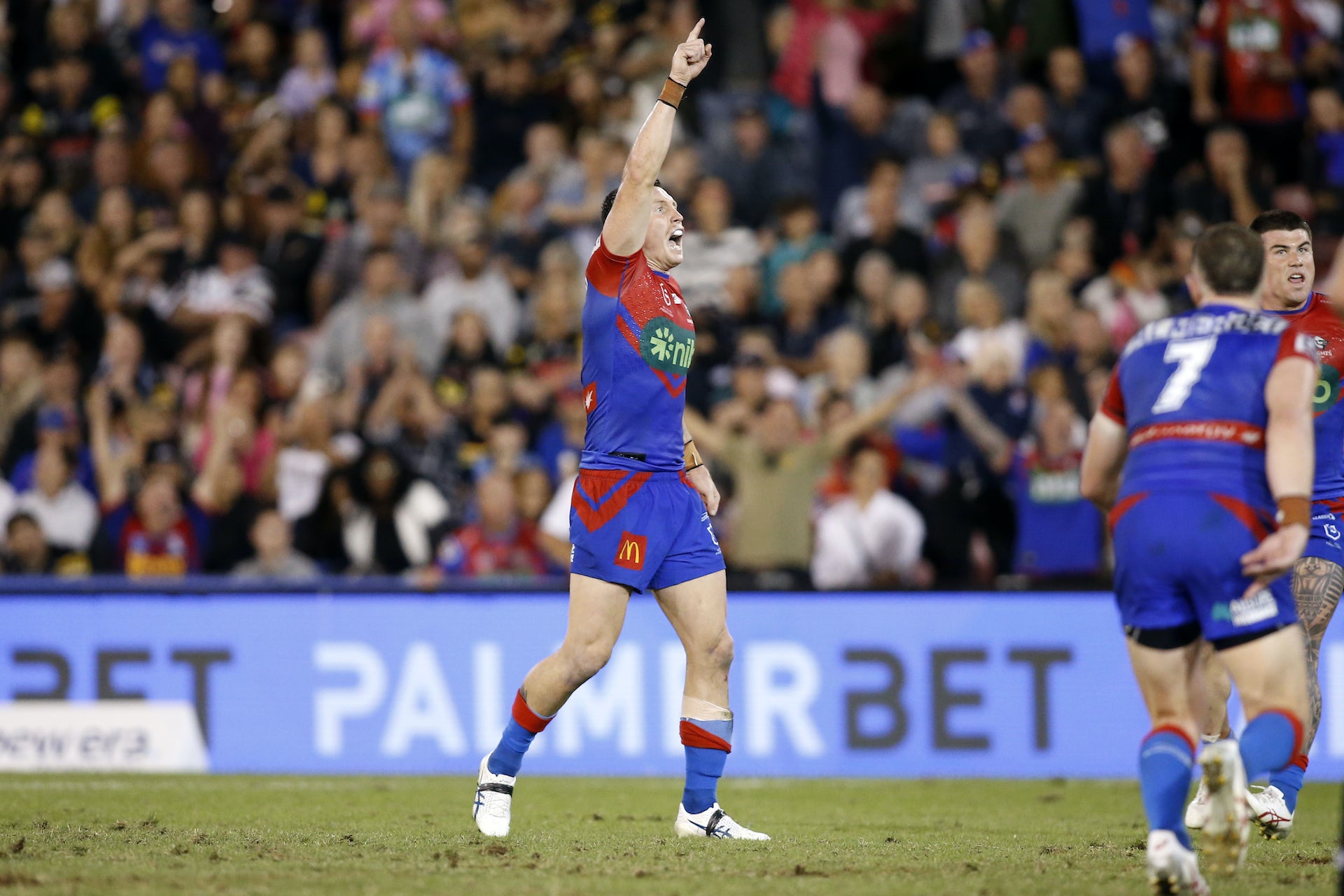 Stadium advertising for gambling at an NRL match.