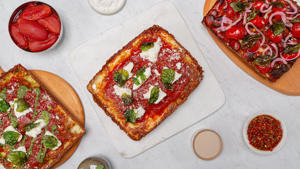 Pizza TBD combines airy and pan pizza styles.