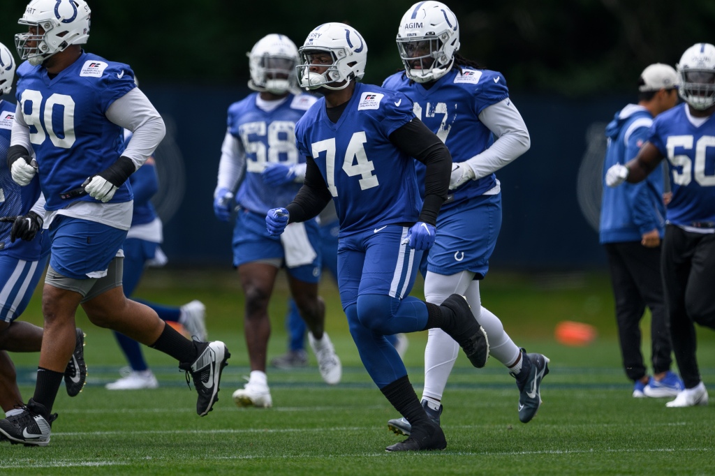 Colts' Rashod Berry runs through a drill at training camp