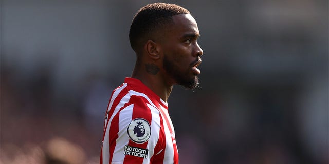 Ivan Toney looks on during match