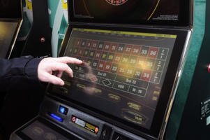 Gambling addict plundered Â£17,000 of sick mum's savings on Betfred game machines and then rang 999 on himself