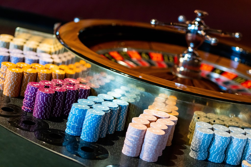 A gambling table with chips for roulette