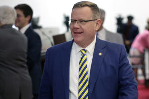 House Speaker Tim Moore walks on the floor Tuesday, May 16, 2023, in Raleigh, N.C., before a North Carolina House session where members voted to override Democratic Gov. Roy Cooper's veto of a bill that would change the state's ban on nearly all abortions from those after 20 weeks of pregnancy to those after 12 weeks of pregnancy. Both the Senate and House had to complete successful override votes for the measure to be enacted into law. The Senate voted to override the veto earlier and the House also voted to override. (AP Photo/Chris Seward)