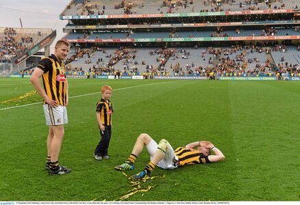 POWER TRIO: Kilkenny's John Power, left, and Richie Power with Richie's son Rory on the pitch after the game. GAA Hurling All Ireland Senior Championship Final Replay, Kilkenny v Tipperary. Croke Park, Dublin. Picture: Brendan Moran / SPORTSFILE