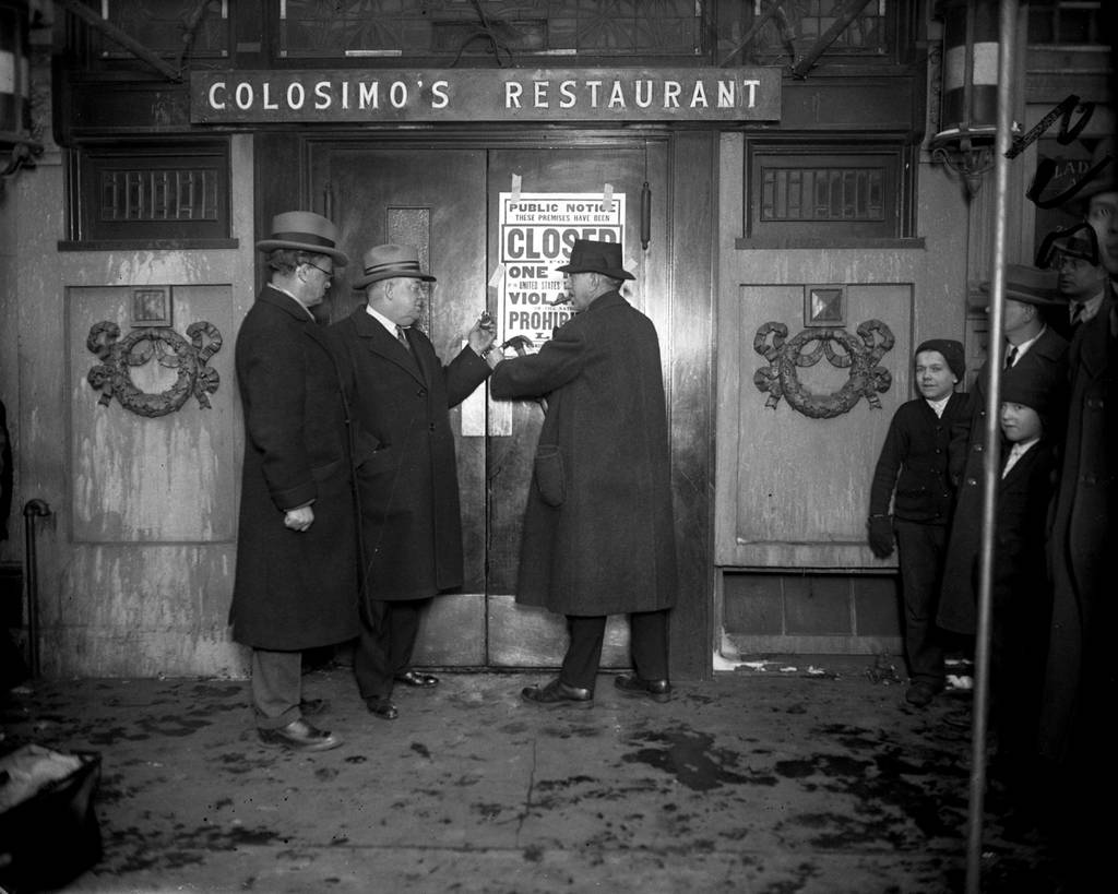 Prohibition workers lock the doors of Colosimo's Restaurant at 2126 Wabash Ave. after a U.S. court ordered it closed for liquor violations during Prohibition in 1926.