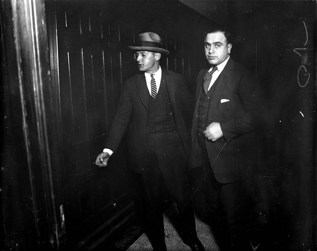 A young Al Capone, right, is in Criminal Court for beer running under the alias Al Brown in an undated photo. 