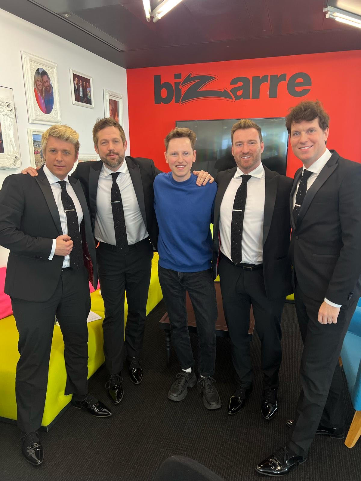 The band pictured with Associate Bizarre Editor Howell Davies