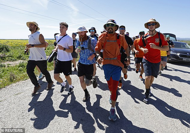 He is pictured making his way to Ras Angela in Tunisia as he attempted to become the first person to run the length of Africa