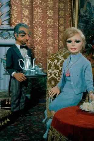 Puppet character 'Lady Penelope' and her butler 'Parker' pictured in a scene from the television series 'Thunderbirds' first broadcast in 1965