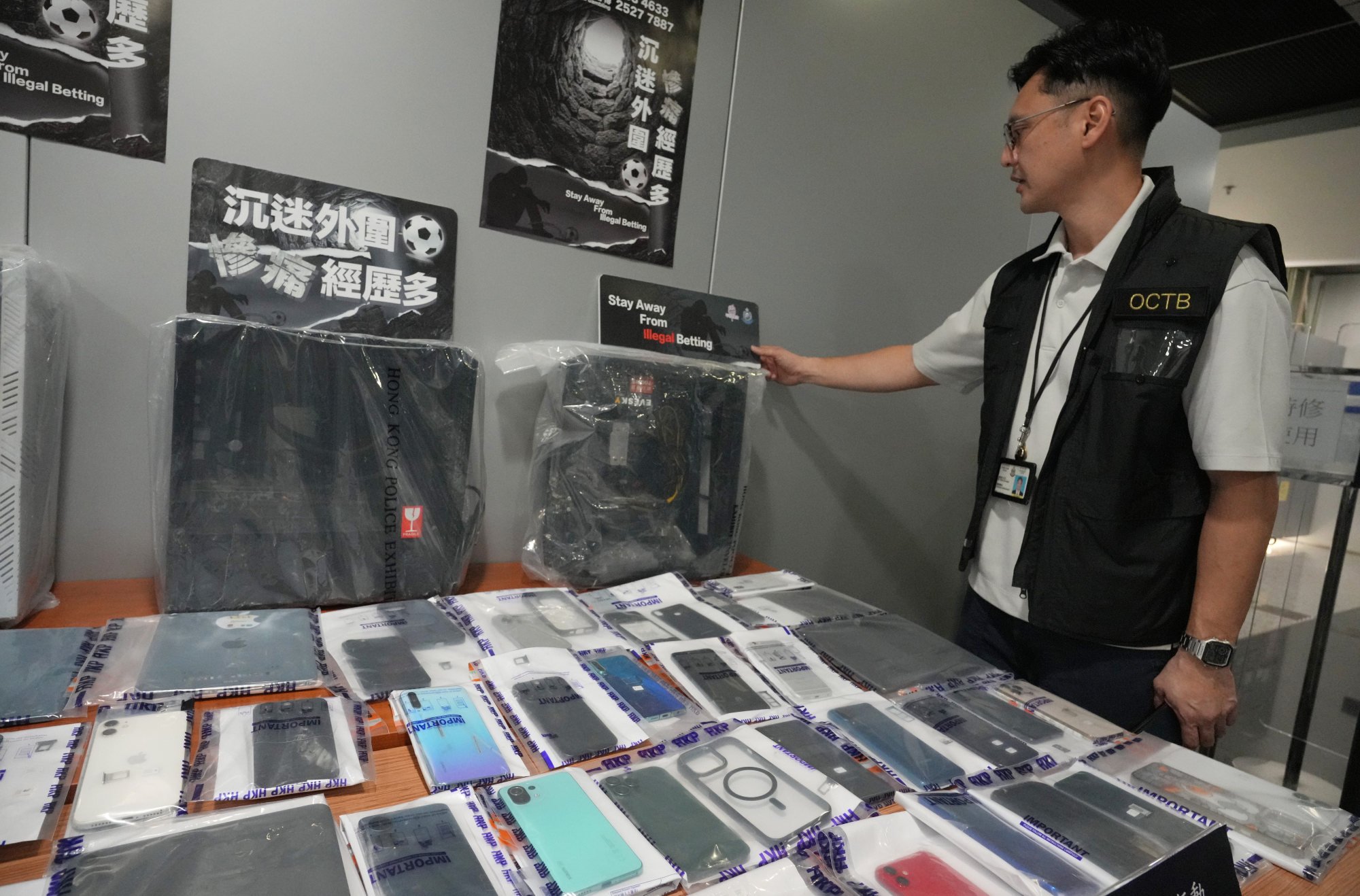 Hong Kong police arrest 57 people in major operation targeting illegal gambling