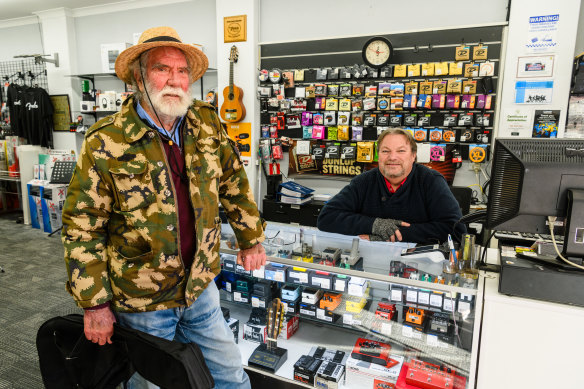 Victor Smith and Mark Hawkins at High Street Music shop, Lithgow, which is run by Hawkins.