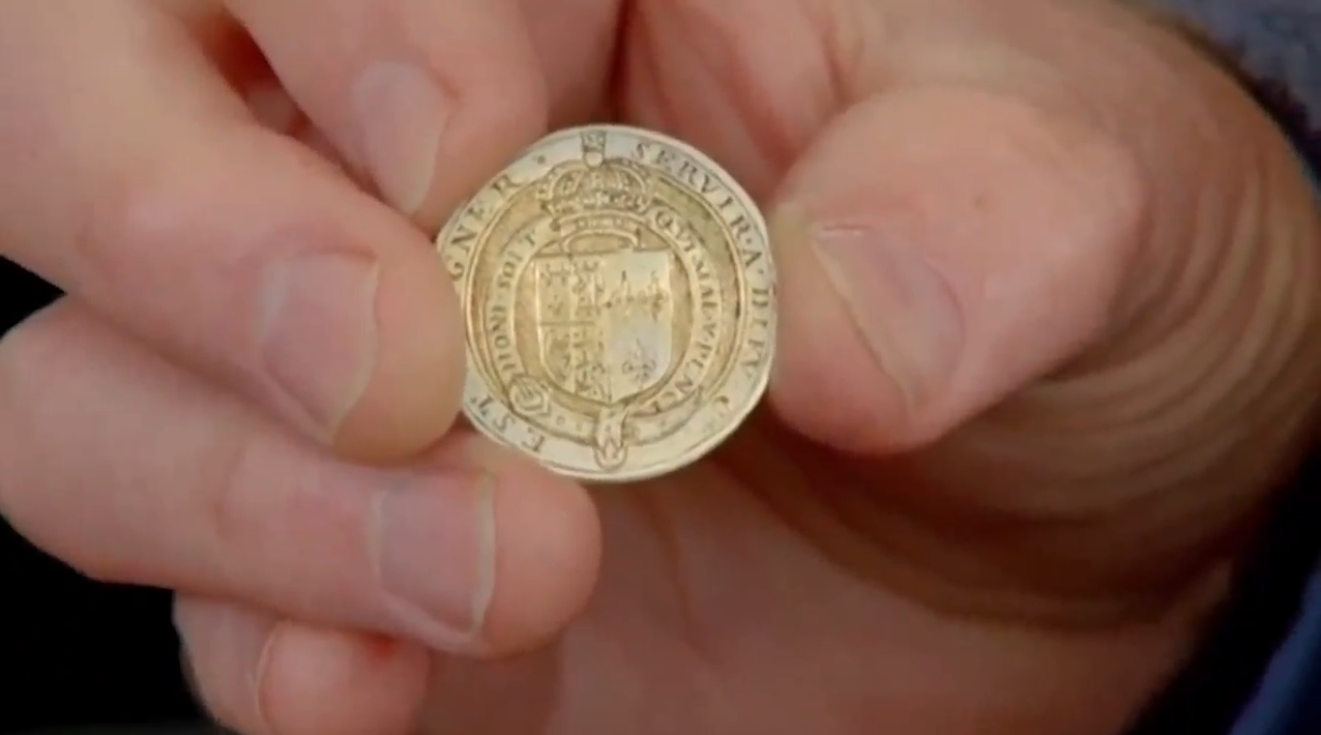 The box was full to capacity of valuable gold counters that were individually engraved