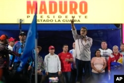 Venezuelan President Nicolas Maduro speaks to supporters during a campaign rally in La Guaira, Venezuela, July 22, 2024.