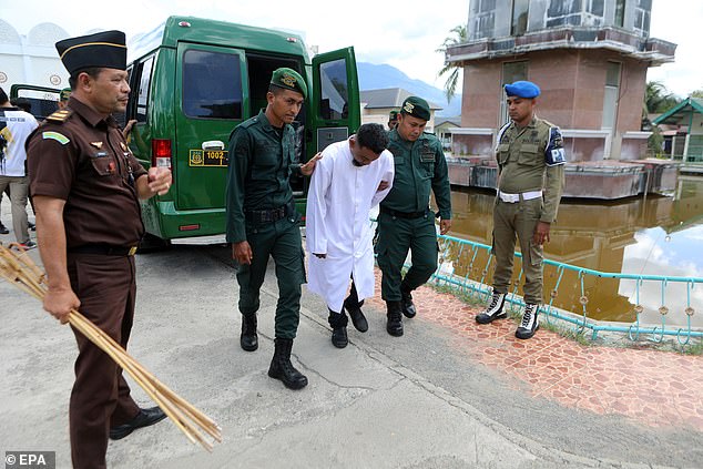 The victims are led from prison vans to receive their punishments on August 30, 2024