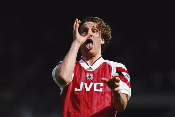 Arsenal player Paul Merson with a drinking celebration after the FA Cup semi final win against Tottenham Hotspur