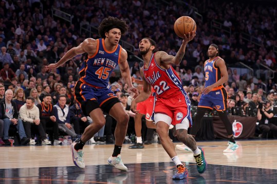 Mar 10, 2024; New York, New York, USA; Philadelphia 76ers guard Cameron Payne (22) drives to the basket against New York Knicks center Jericho Sims (45) and forward Precious Achiuwa (5) during the second quarter at Madison Square Garden. Mandatory Credit: Brad Penner-USA TODAY Sports