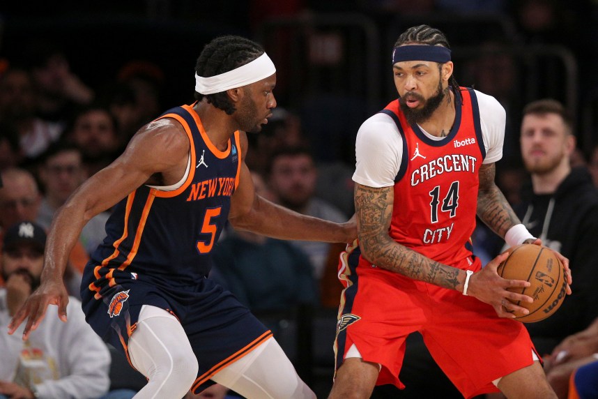 Feb 27, 2024; New York, New York, USA; New Orleans Pelicans forward Brandon Ingram (14) controls the ball against New York Knicks forward Precious Achiuwa (5) during the second quarter at Madison Square Garden. Mandatory Credit: Brad Penner-USA TODAY Sports