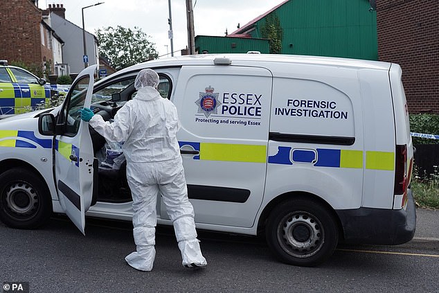 Forensic police at the scene of the crime last September. McCullough told officers immediately where they could find her parents' bodies