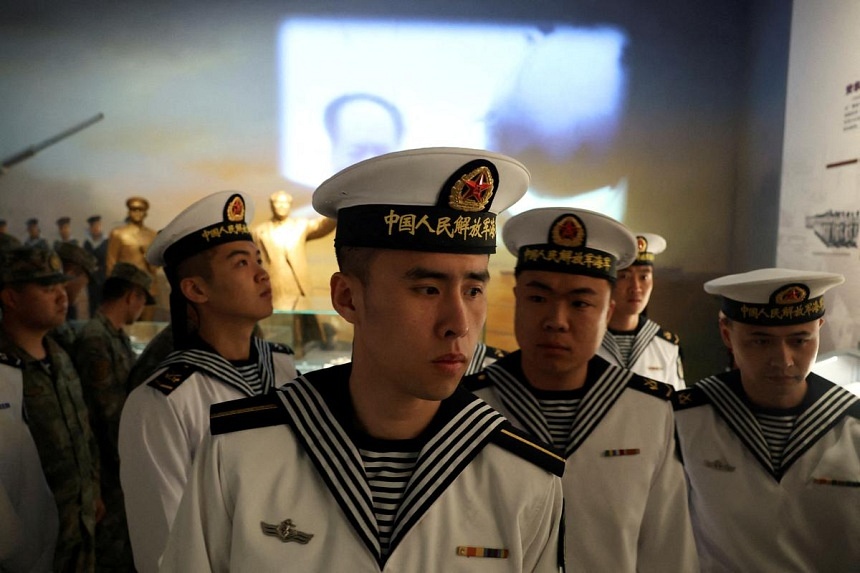 China warns young soldiers against online dating, gambling