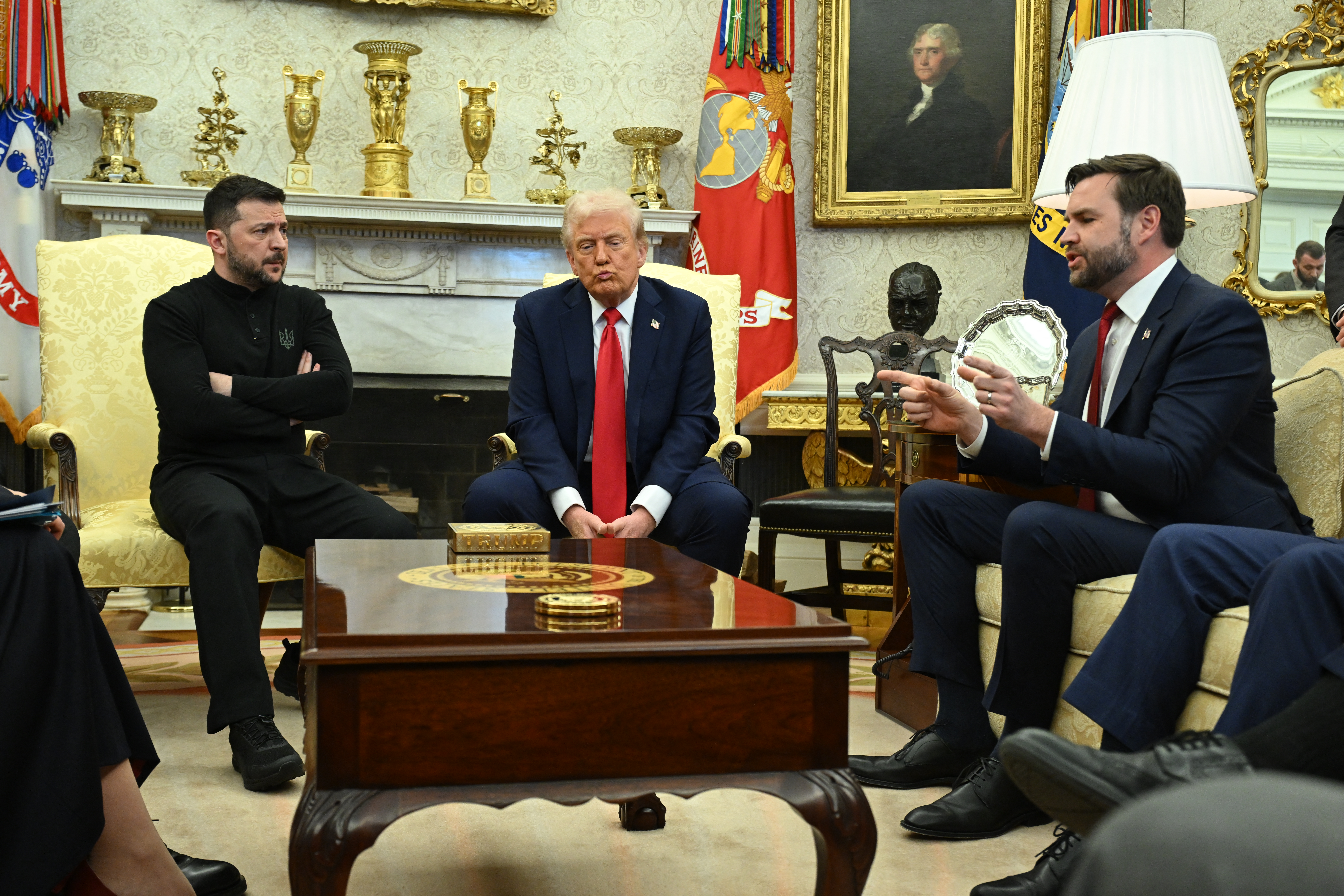 US President Donald Trump and Ukraine's President Volodymyr Zelensky listen to Vice President JD Vance (R)as they meet in the Oval Office of the White House in Washington, DC, February 28, 2025. Zelensky on February 28 told Trump there should be "no compromises" with Russian President Vladimir Putin as the parties negotiate to end the war after Moscow's invasion. (Photo by SAUL LOEB / AFP) (Photo by SAUL LOEB/AFP via Getty Images)