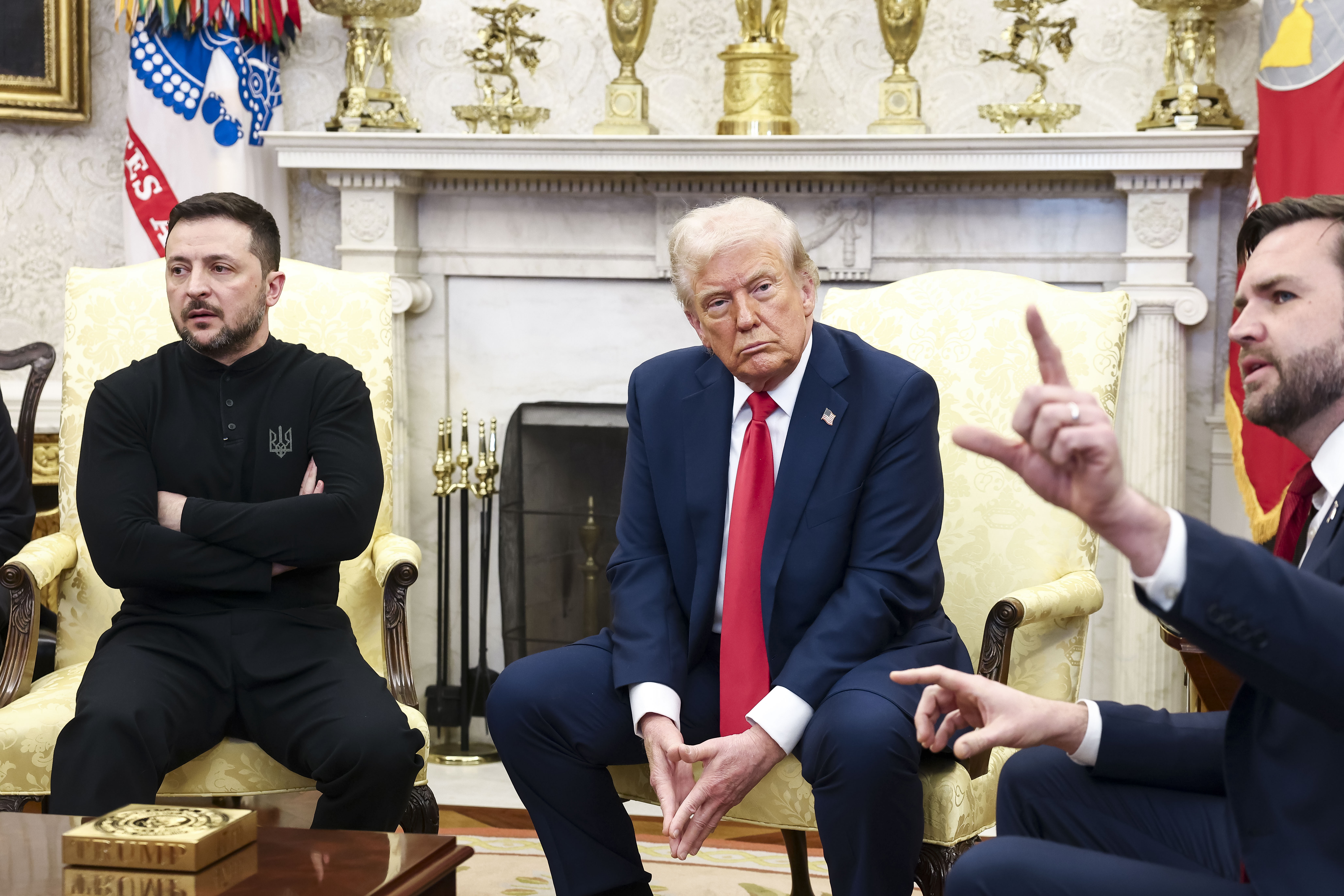 Donald Trump, Volodymyr Zelenskyy, and J.D. Vance in a meeting.